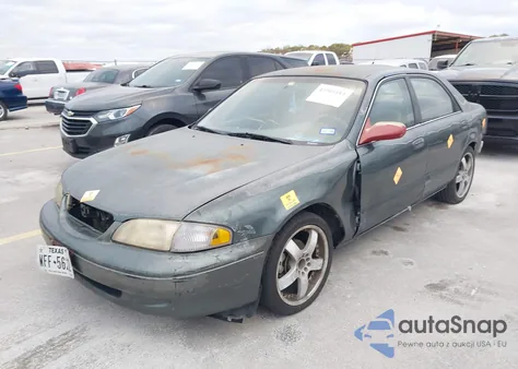 1998 Mazda 626 Dx/Lx z USA, uszkodzony, nr VIN 1YVGF22C3W5772322